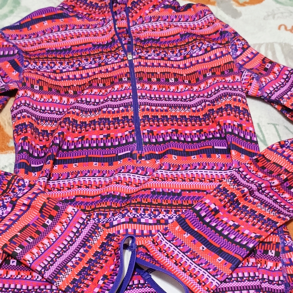 Nike Pink and Purple Kids One Piece Footie